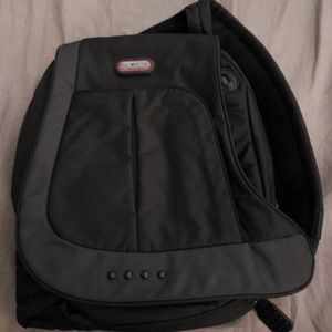 Tumi crossbody backpack